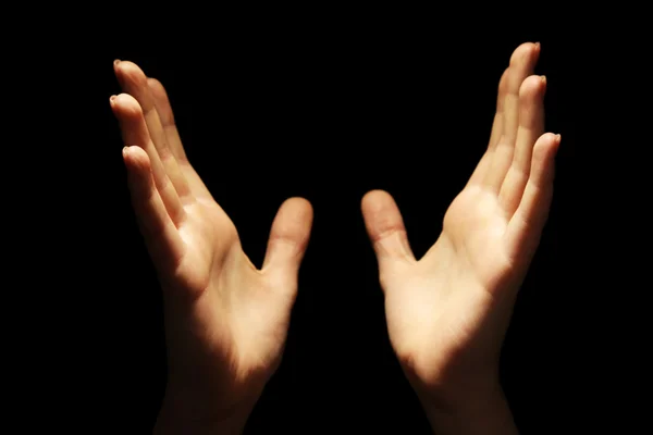 Female hands on dark background — Stock Photo, Image