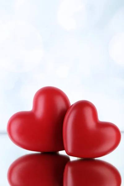 Red hearts on light background Stock Photo