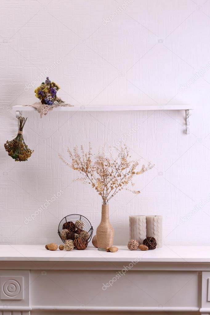 Still life of dried flowers on white wall background