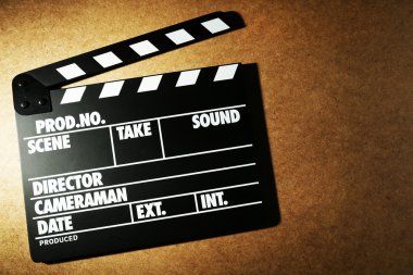 Tahta arka planda film alkışlaması