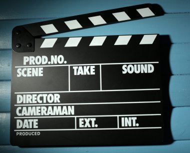 Tahta arka planda film alkışlaması