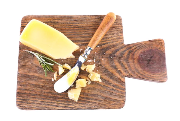Crumbled Parmesan cheese with sprig of rosemary and knife on cutting board isolated on white — Stock Photo, Image