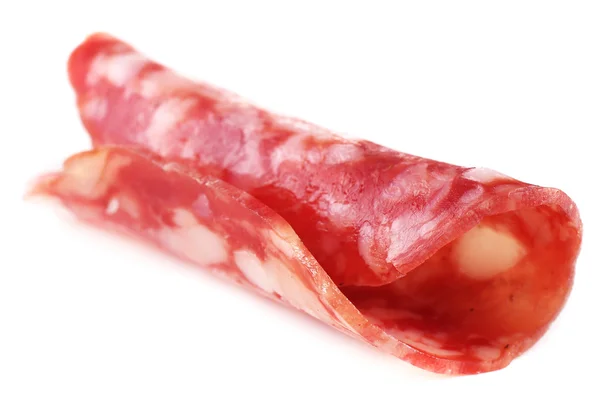 Fetta di salame isolata su fondo bianco — Foto Stock