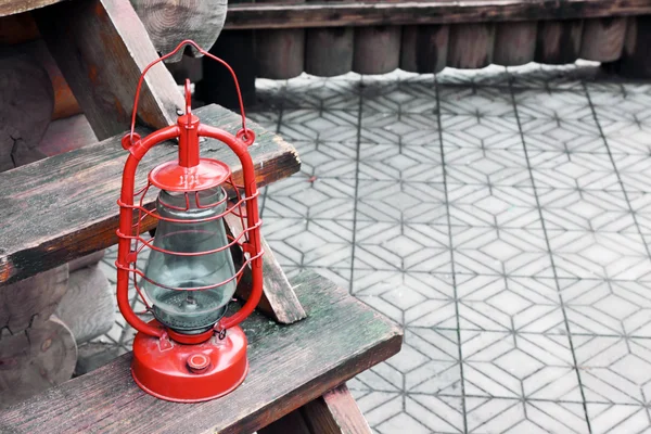 Kerosene lamp on wooden stairs, outdoors — Stock Photo, Image