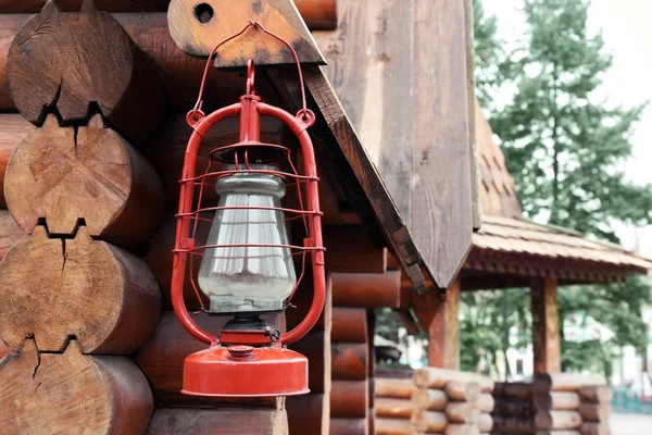 Kerosene lamp hanging on  house — Stock Photo, Image