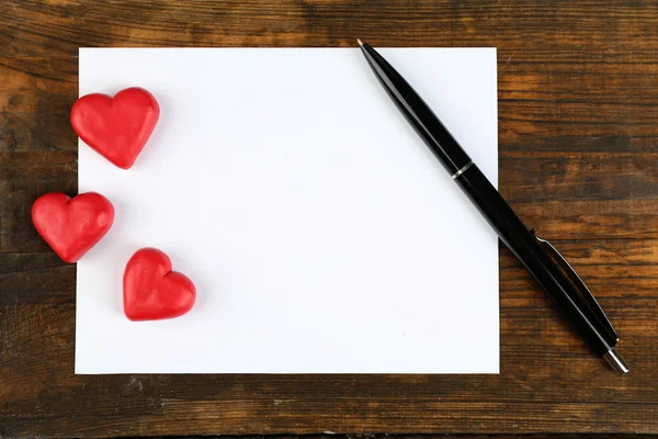 Blank sheet of paper with hearts — Stock Photo, Image