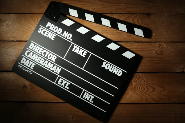 Movie clapper on wooden background — Stock Photo, Image