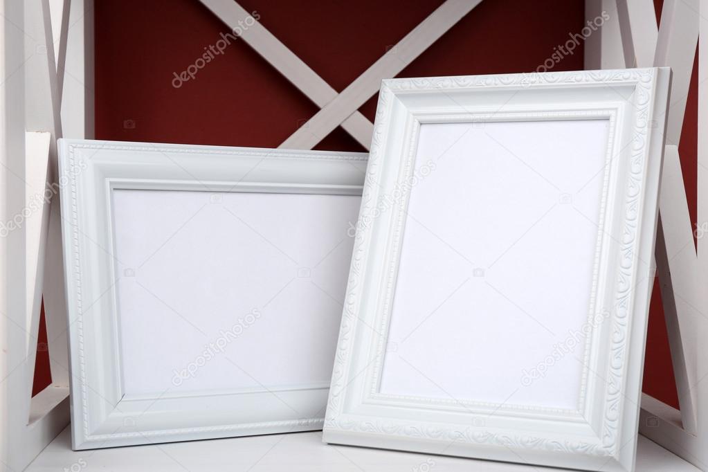 Photo frames on shelf