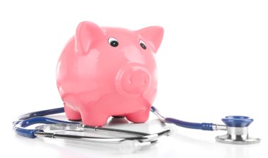 Beyaz izole stetoskop ile Piggy banka