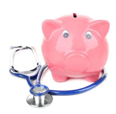 Beyaz izole stetoskop ile Piggy banka