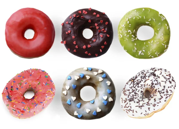 Köstliche Donuts Collage, isoliert auf weiß — Stockfoto