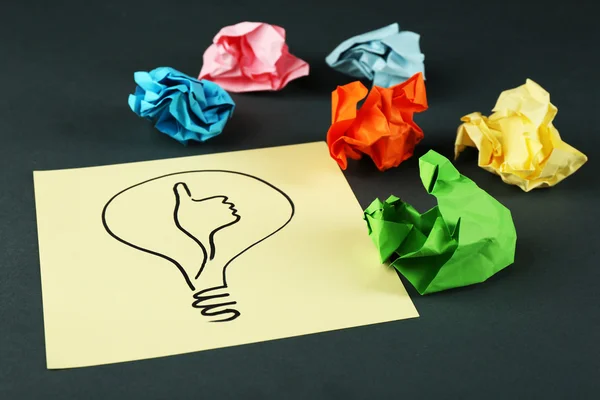 Symbol of idea as light bulb — Stock Photo, Image