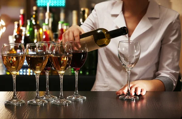 Bartender at counter on bar — Stock Photo, Image