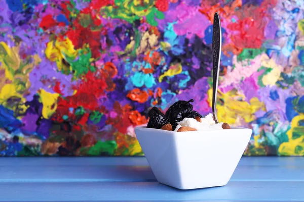 Dessert with prunes in bowl — Stock Photo, Image