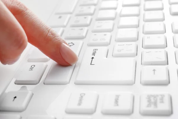 Hand typing on keyboard — Stock Photo, Image