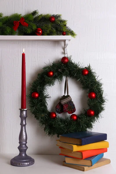 Christmas wreath on shelf — Stock Photo, Image