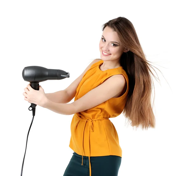 Mulher bonita com cabelo longo segurando secador de cabelo isolado no branco — Fotografia de Stock