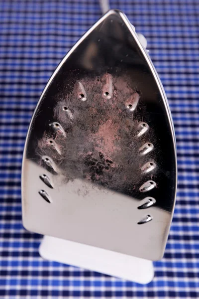 Flat iron with burnt mark — Stock Photo, Image