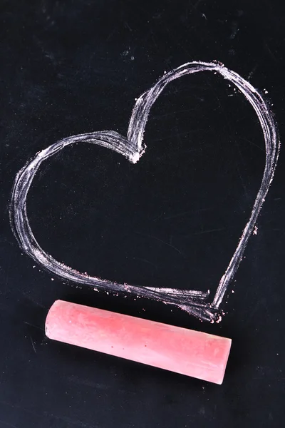 Heart drawn of chalk on blackboard close-up — Stock Photo, Image