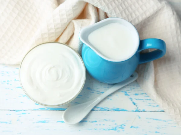 Dairy products on wooden table background — Stock Photo, Image