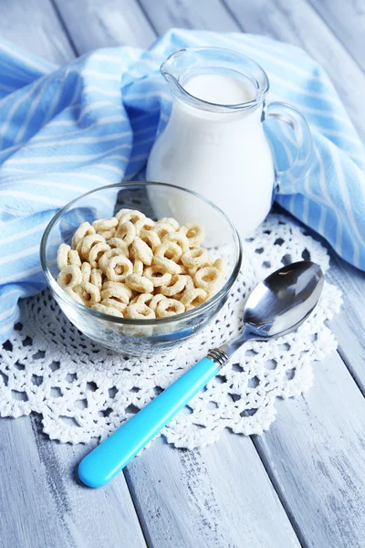 Homemade yogurt and delicious  cereals in bowl on wooden table background — Stock Photo, Image