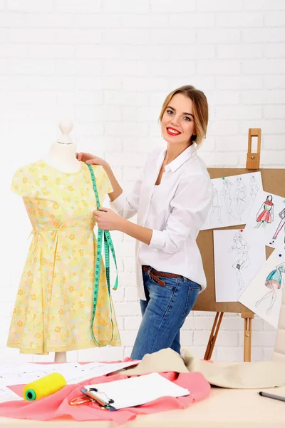 Beautiful young dressmaker — Stock Photo, Image