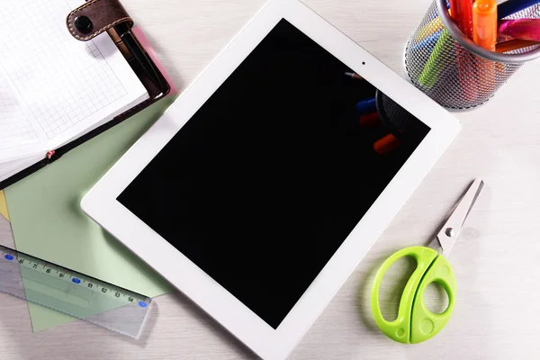 Tablet PC with office supplies — Stock Photo, Image