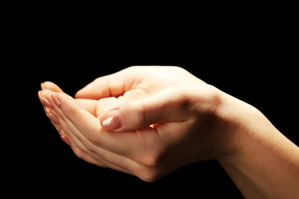 Female hands on dark background — Stock Photo, Image