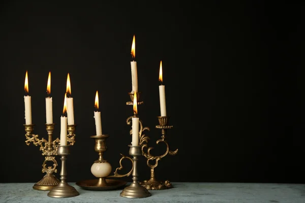 Retro candlesticks with candles — Stock Photo, Image