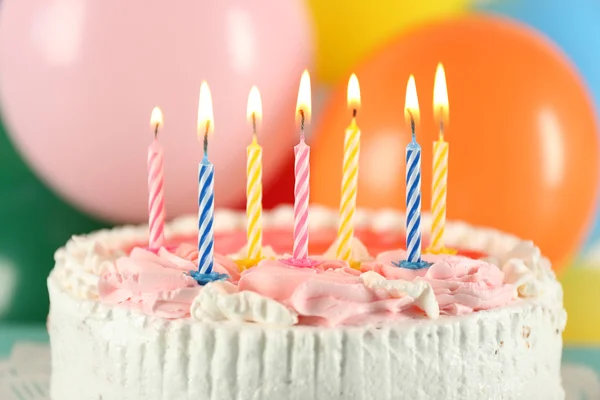 Delicious birthday cake on table on bright background — Stock Photo, Image