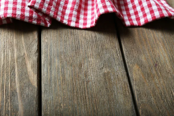 Guardanapo na mesa de madeira — Fotografia de Stock
