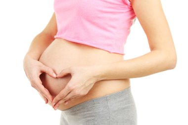 güzel genç hamile kadının karnı üzerinde beyaz izole dokunmadan