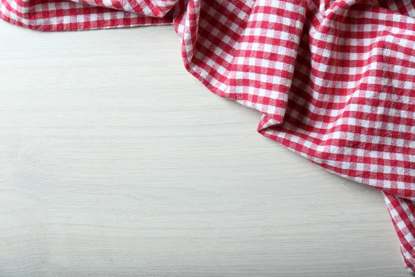 Napkin on wooden table — Stock Photo, Image