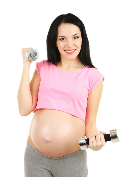 Jeune femme enceinte avec haltères isolées sur blanc — Photo