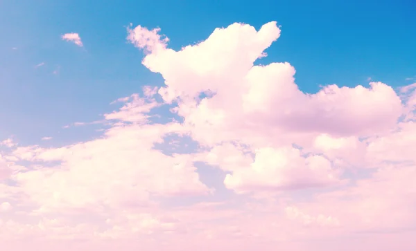 Blue sky background with pink clouds — Stock Photo, Image