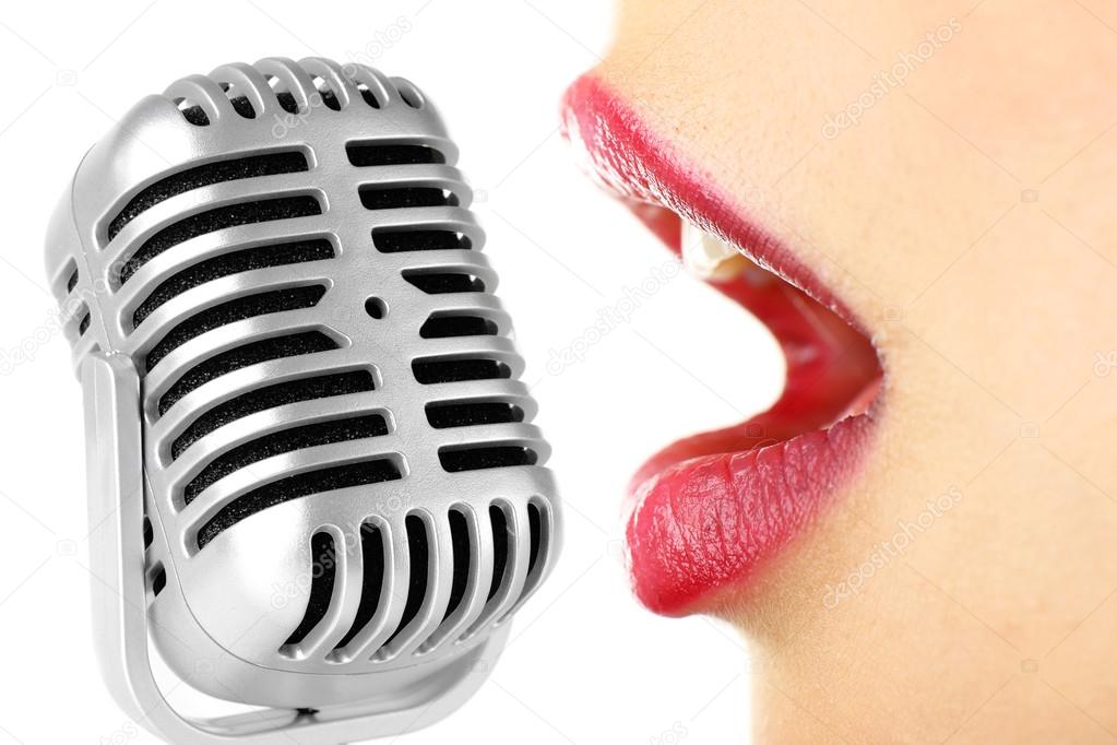 Singing woman and retro microphone, karaoke concept