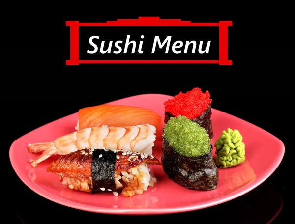 Delicioso sushi servido en plato aislado en negro con espacio para su texto —  Fotos de Stock