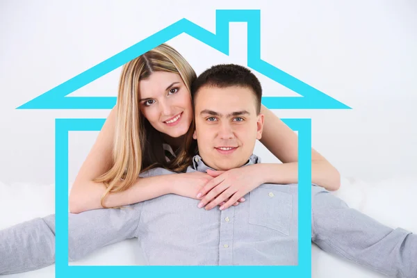 Loving couple in drawing house — Stock Photo, Image