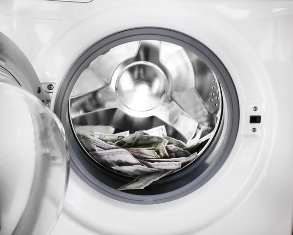 Money in washing machine, closeup view — Stock Photo, Image