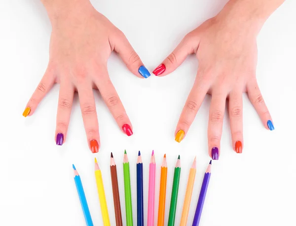 Manicura femenina multicolor con lápices de colores aislados en blanco — Foto de Stock