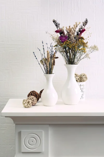 Composition of dried flowers on white wall background — Stock Photo, Image