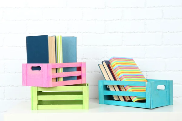 Many books in crates — Stock Photo, Image