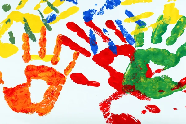 Hand prints of paint on white background — Stock Photo, Image