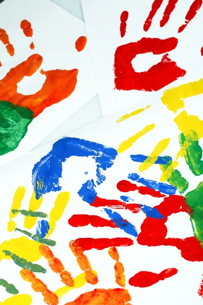 Hand prints of paint on white background — Stock Photo, Image