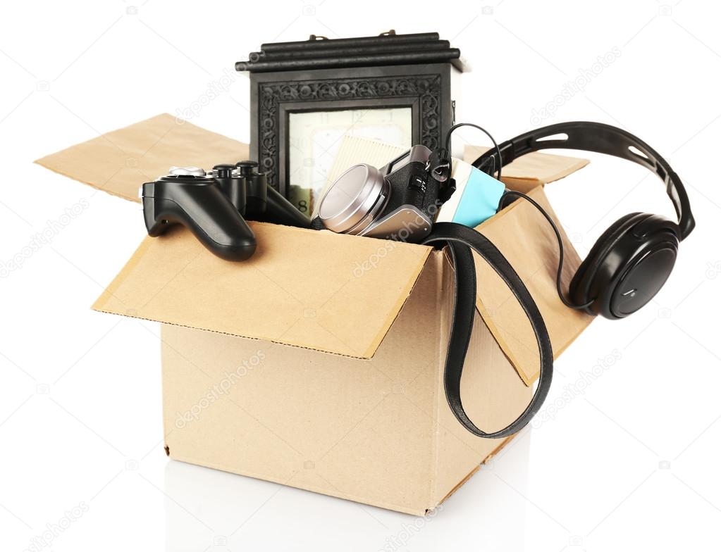 Box of unwanted stuff isolated on white