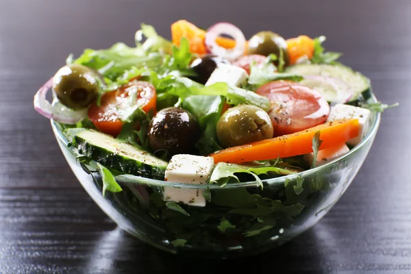 Greek salad in glass dish — Stock Photo, Image