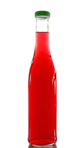 Πολύχρωμο αλκοολούχο ποτό σε γυάλινο μπουκάλι που απομονώνονται σε λευκό — Φωτογραφία Αρχείου
