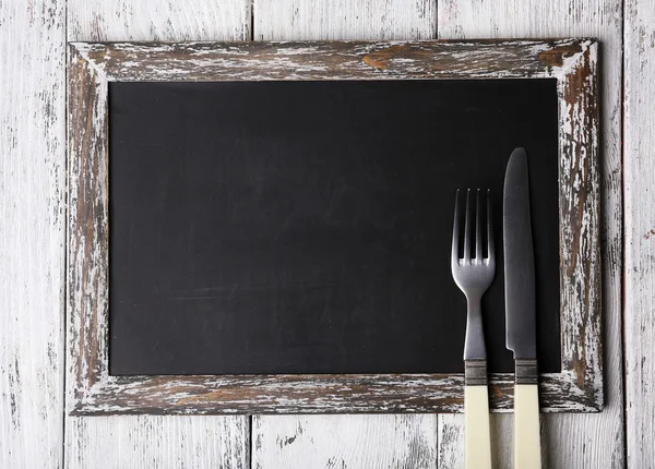 Menu board op een houten planken achtergrond kleur — Stockfoto