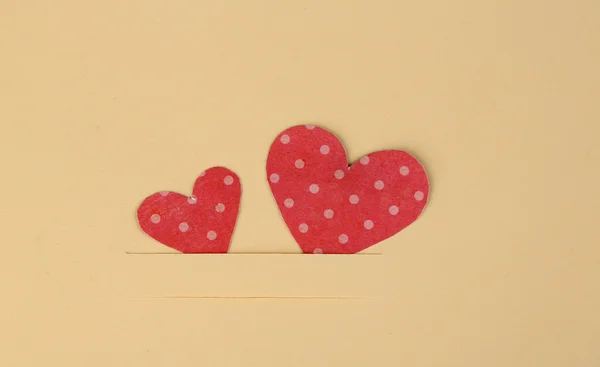 Paper hearts on beige — Stock Photo, Image