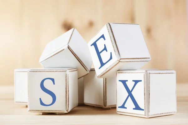 Секс, написанный в цвете деревянных блоков — стоковое фото
